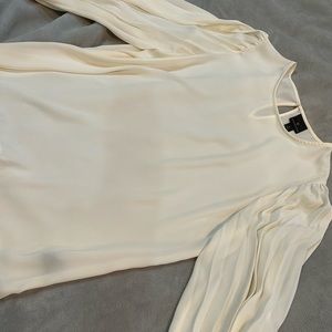 Worthington sheer cream blouse. 100% Polyester. Size Large .